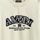 AMIRI 2026秋冬新作 スノーウォッシュ カレッジロゴ クルーネックスウェットシャツ 杏色 男女兼用 メンズ レディース