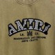 AMIRI 2026秋冬新作 スノーウォッシュ カレッジロゴ クルーネックスウェットシャツ 岩石灰 男女兼用 メンズ レディース