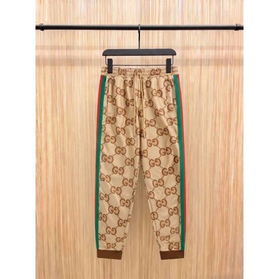 GUCCI グッチ 2026早春新作 ジャンボGG スーパーGG 総柄 ウェビングライン（赤緑） ジョガーパンツ トラックパンツ キャメル 男女兼用